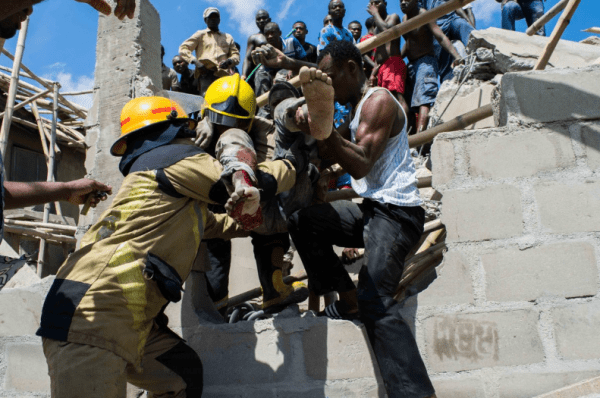 7 School Pupils, including 12 adults have just been rescued alive from the Lagos school building collapse, earlier today.