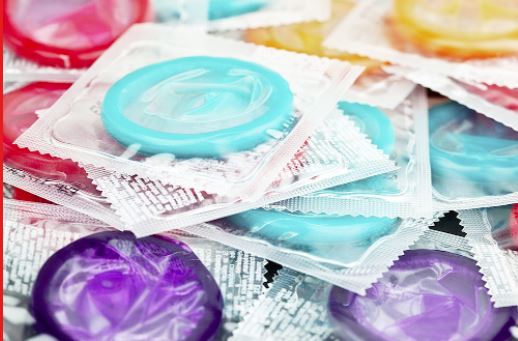 Fetish Priest Distributes Condoms